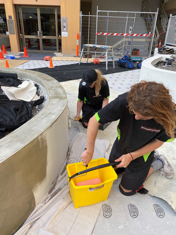 Rohan and Bel from JMRWATERPROOFING applying ARDEX WPM310 to external planter box walls.