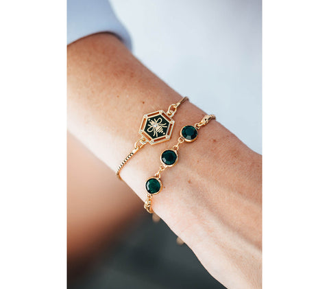 Woman Wearing AIR AND ANCHOR green bracelets