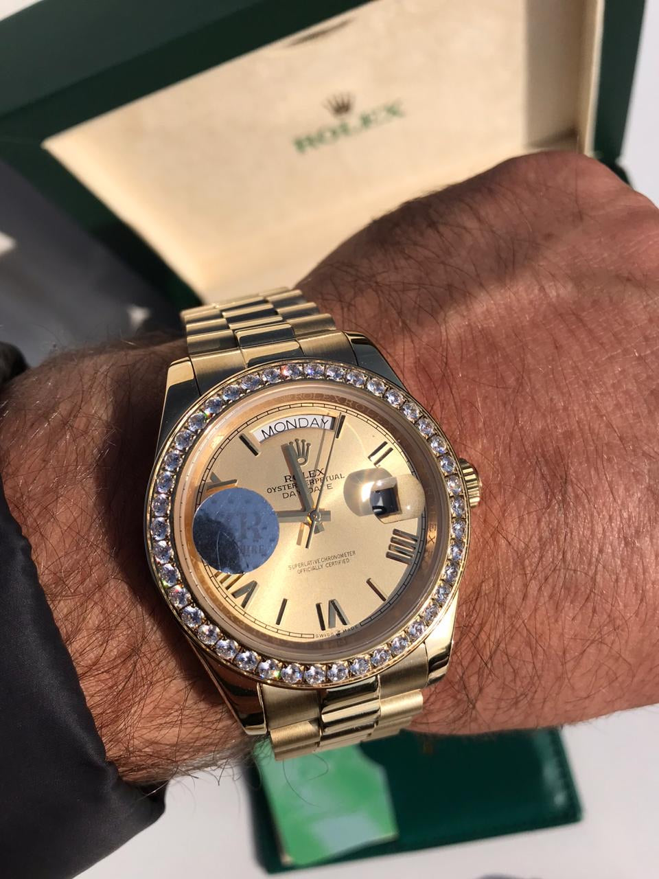 rolex day date gold iced out