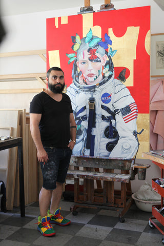 Artist Minas Halaj in his studio with his latest work 'Butterfly #9'
