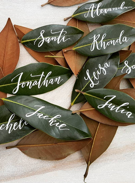 Magnolia Leaf Place Cards with White Calligraphy