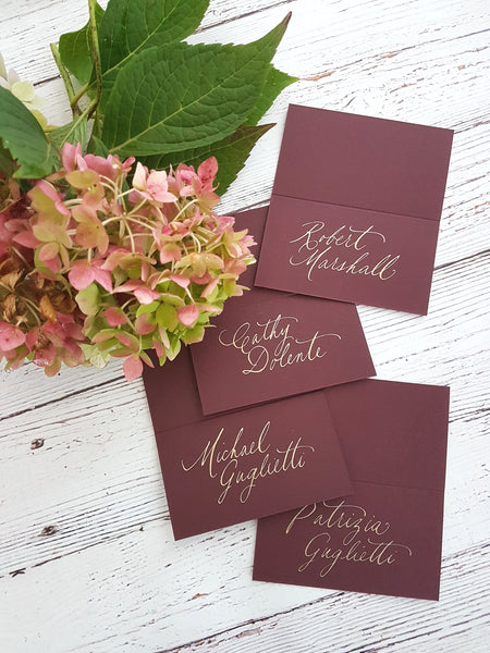 Merlot place cards with gold Calligraphy