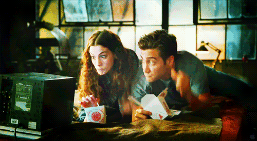 Gif of A Couple Watching A Movie
