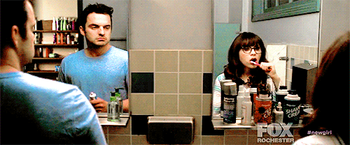 Gif video of man and woman standing in bathroom together