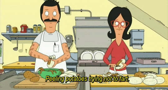 Gif of A Couple Peeling Potatoes Not To Fart