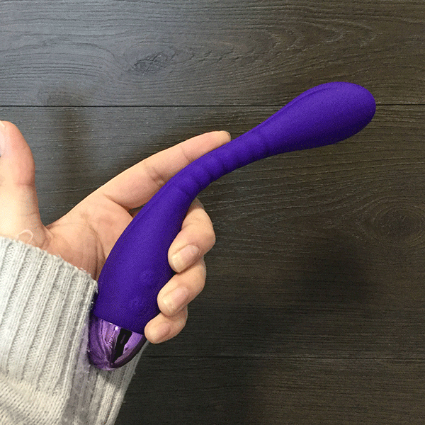 Purple G Spot Vibrator Shown Held In Hand To Show Size Of The Product