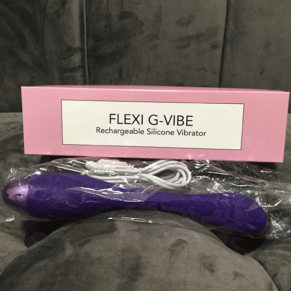 Purple G Spot Vibrator Shown In Original Boxed Packaging With Charger