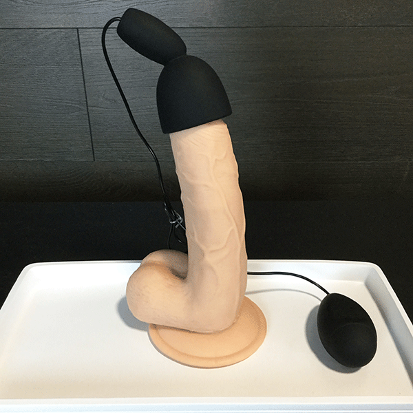 pink bob vibrating stamina trainer on dildo