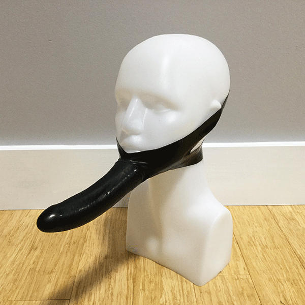 Strap on dildo worn on the face - shown on model