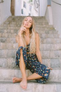 Jessica-Anne sat on Ibiza stone stairway