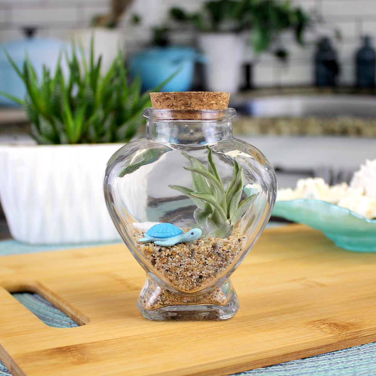 large heart shaped glass jar with cork