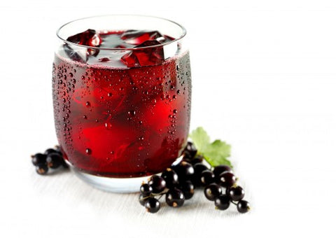 Elderberry Juice in a glass by Ashbolt Farm