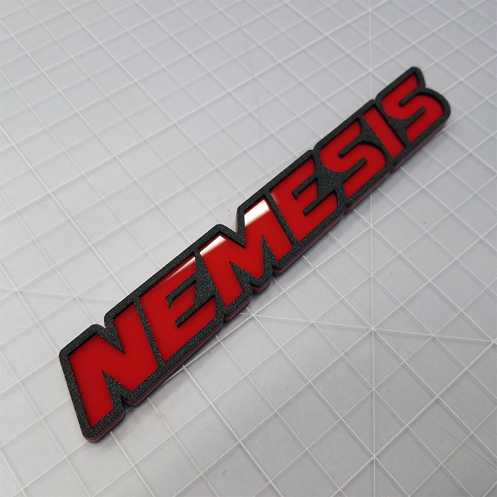 nemesis car badge