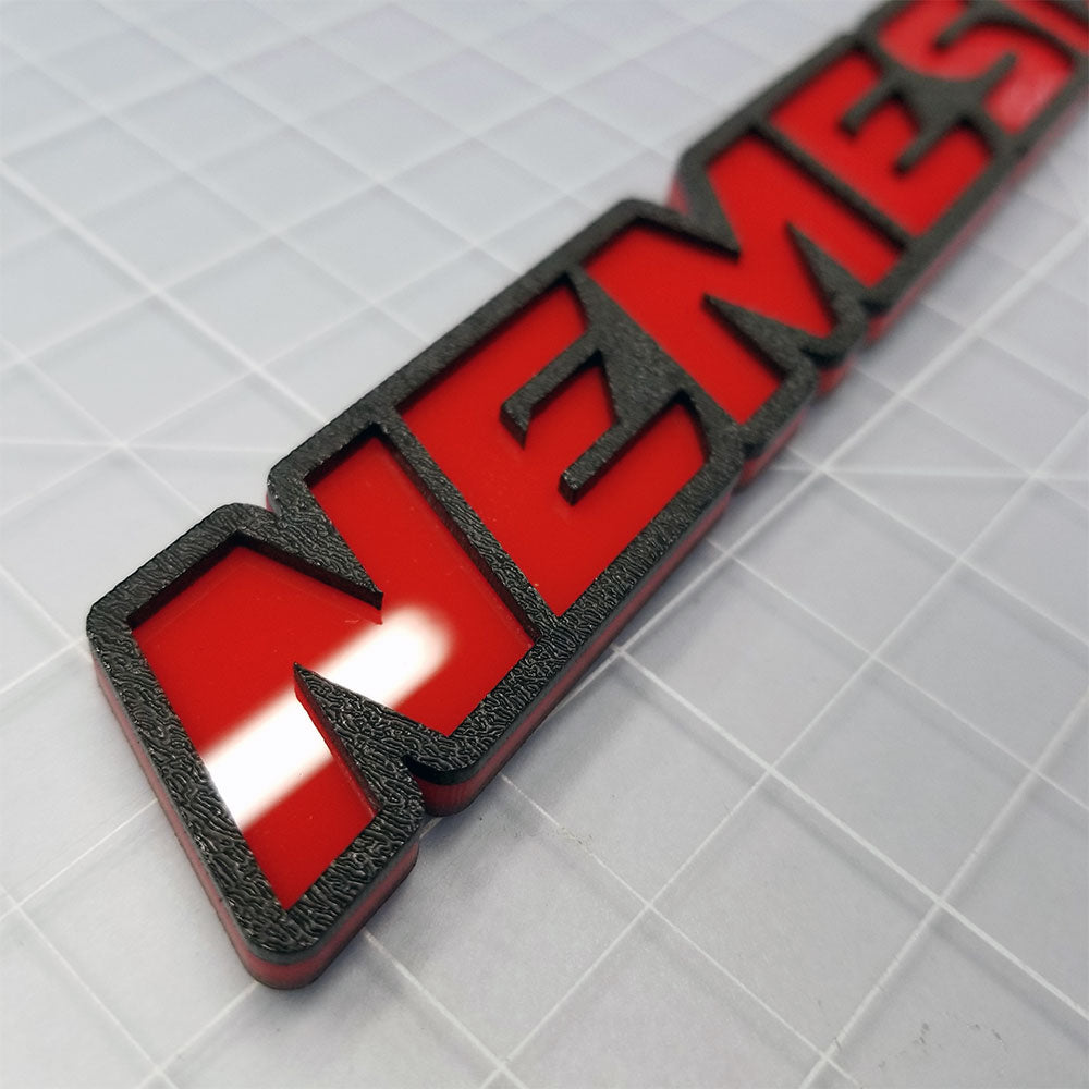 textured car badge