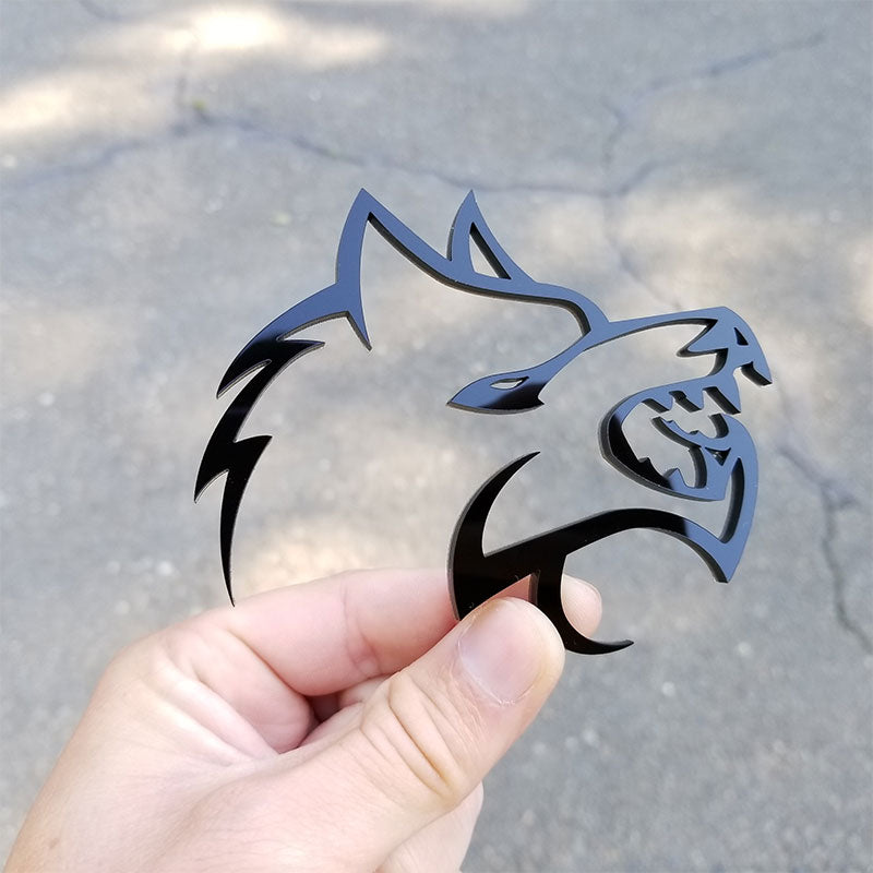Black acrylic wolf head emblem