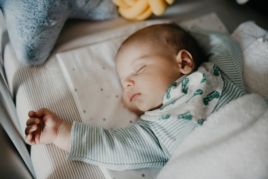 baby sleeping in crib