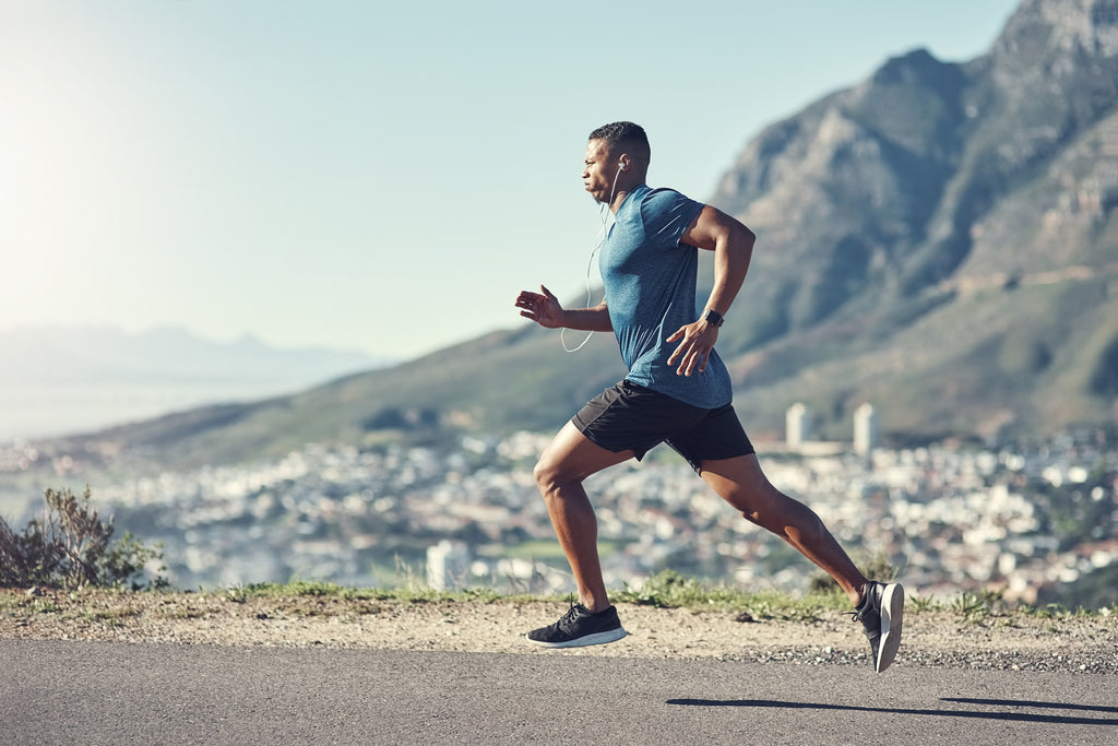 man running on road using exercise to sleep better