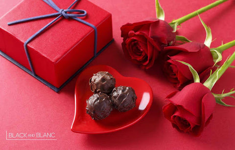 Chocolate and roses; Winning combination       yes, all of us have tried the combination of chocolate and roses together.  No matter on which occasions, but to be honest, they oddly match.  You may ask why it's like that? Why on earth they should be this much perfect together.  We don't have any definite answer to that, but it may have a psychological reason.  Anyway, we have seen this lovely combination of Valentine's day a lot.  Indeed you may have seen it just for valentine's day.  But is there any law about it? Who said we could use these lovely and romance kinds of stuff just for valentine's day?  For sure, nobody. There is even no sign of it in the Bible or the Holy Quran!  So why don't you try it for others' day? Are you looking for some excellent occasion to surprise your partner?  What's better than world chocolate day?  I'm a hundred percent sure your partner loves chocolate.  Pardon me, but who the hell doesn't love chocolate on the earth?  At least I haven't seen anyone till now I'm writing this article.  So make a different surprise for her or even him to try it in a newer way.  It shouldn't always be something expensive to make your partner happy.  Try this one, and you will understand how easy you can show your love.  Buy your soul mate some of her or his favorite chocolates and, of course, the favorite color of roses.  And that's it, true love.  True love shouldn't cost you that much necessarily.  As a piece of advice, I have to tell you that simple kinds of stuff will always show your feeling in a better way.  A bouquet of roses, some chocolates, a romance letter full of your emotion, a printed photo from a lovely diary, and your favorite music!  That's it. Trust me, and nothing would work better than this perfect combination.  Do you want to make this surprise memorable for years?  So let me suggest the best way for it.  But before my suggestion, have you ever heard of infinity roses?   It may seem a bit odd, but that's real.  Maybe not infinity in that way but infinity in some way.  We all know that usually, roses can't stay alive for more than a week. And that's the maximum period we can consider for that.  This short period is not desirable happening.  What if you could have your gifted roses fresh and alive for years?  That would be so nice for sure.  But it's not just a wish! We made it happen.  In black and blanc fleur, we provide you natural rose, which will last for years.  Natural roses for years? Yes, you are right; it may seem a bit odd.  You may ask yourself how this can happens even, but we made it possible here at black and blanc fleur.  You can order these beauties easily from our website, and we will bring it to you ASAP with our same-day delivery.  These roses come from the heart of France and handmade in Dubai.  Black and blanc fleur team try to use the best quality roses you've ever seen.  We have most of the popular colors in our online rose shop.  So don't worry about the color. You will find your partner's favorite color for sure.  Also, we have different kinds of boxes which you can choose among them.  All you have to do is to click the shop word and directly go to our website and choose whatever you love.  Happy chocolate day!      It's kind of those sentences you may haven't heard that much.  Chocolate day is one of those days that lovers would rarely celebrate it!    But why not?  It won't be harmful to be a bit different.  As Steve Jobs said, "think different.".  Being different makes you stay alive in their mind forever.  So make a special day for your partner by saying happy chocolate day and surprise her or him.  Whar's The History Of Chocolate Day?  If you a chocolate day lover, it's not wrong to know a little about it.  The story of chocolate goes back about 2,500 years.   The Aztecs loved their lately created liquid chocolate to the degree that they believed the god of wisdom, Quetzalcoatl, actually presented it upon them.   Cocoa seeds even worked as a kind of money.   Could you imagine going shopping or purchasing a home will a massive pile of Cocoa seeds?  It would be fantastic, no?   These days, the chocolate was bitter, as it was long before sugar was one of stuff to be added.  Once chocolate took a turn and operated sweet in a 16th Century Europe, chocolate jumped on to the masses. It became one of many households' favorite treats.   Many present-day chocolate companies began conducting in the 19th and beginning 20th centuries.  Cadbury began in England near 1868.   And then 25 years later, Milton S. Hershey bought a chocolate processing machine at the World’s Columbian Exposition in Chicago.  He is now one of the greatest and world-known chocolate producers in the world.   He launched the company by manufacturing chocolate-coated caramels.   Nestlé began back in the 1860s and has developed into one of the most significant food conglomerates in the world.   You're bound to or heard of one of these if not all of them.  Maybe you also appreciate a bar or two of their exquisite chocolate pieces at home.   In the end black and blanc fleur team wish you a happy chocolate day.