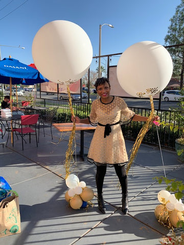 Kristy Cooper The Fancy Mom with Stars Above Balloons display