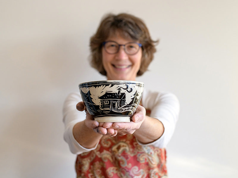 Artist Karen Gray with pottery bowl