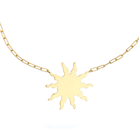 Sun talisman hung from thick gold chain