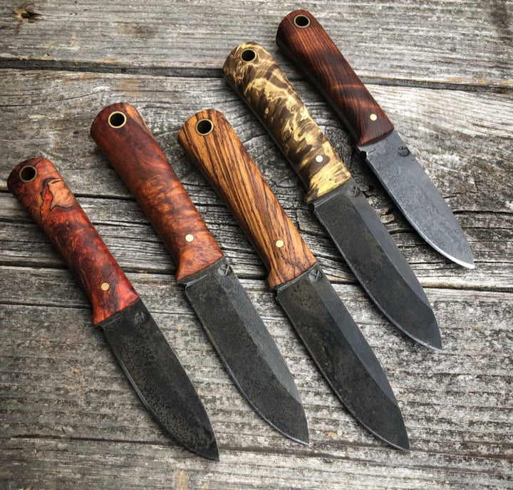 carbon steel outdoor knives made in the usa. handmade hunting, fishing, camping, bushcraft, edc knives. stainless steel. aeb-l, 01 carbon.