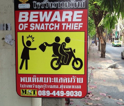 Motorbike snatch thief