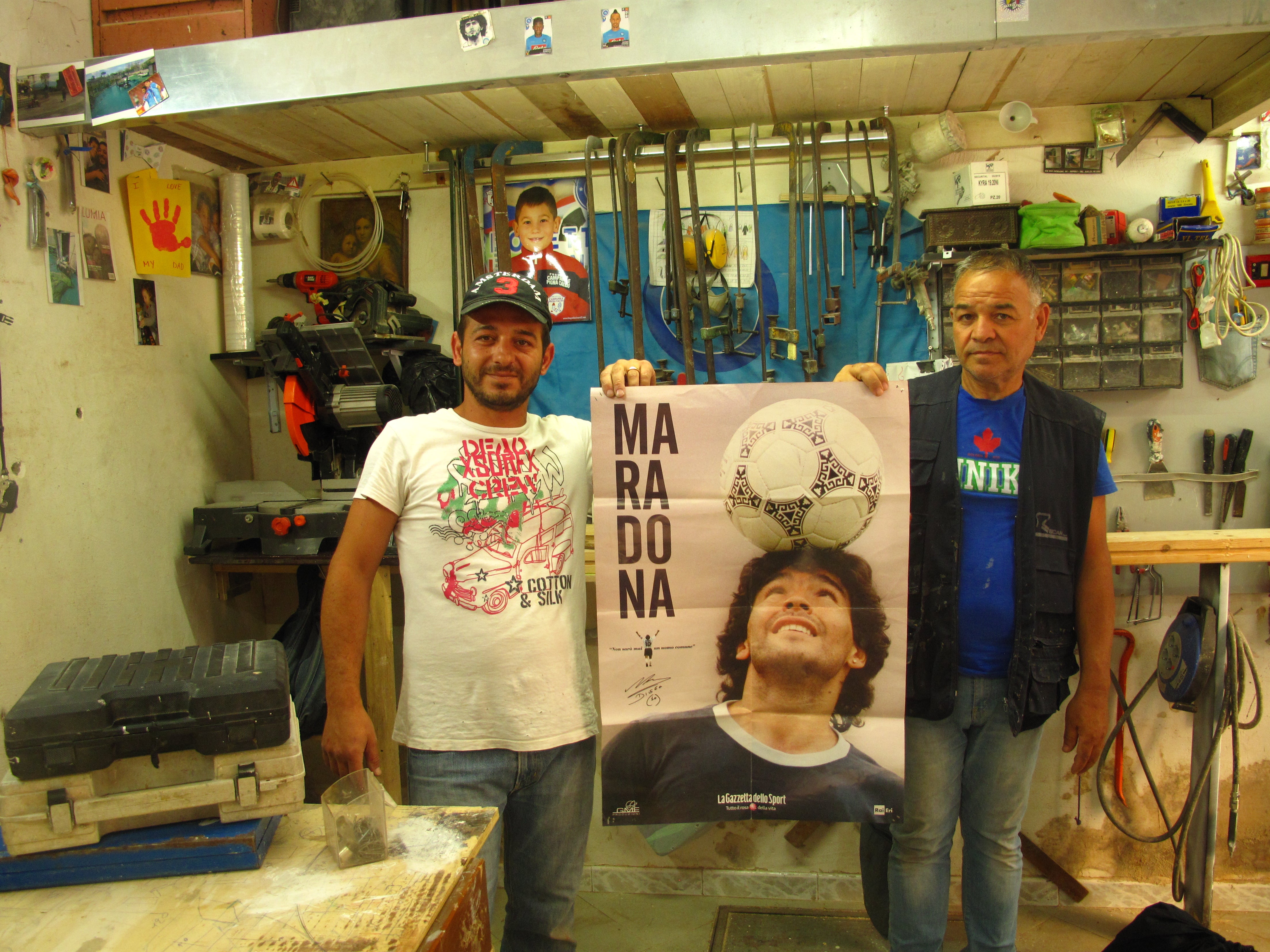 Carpenters with a Diego poster