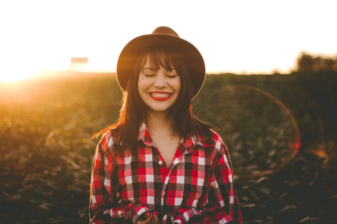 Woman looks happy and contented