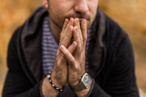 A middle-aged man looking anxious