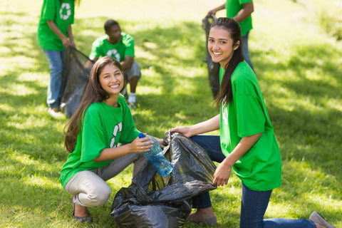 volunteers cleaning the park