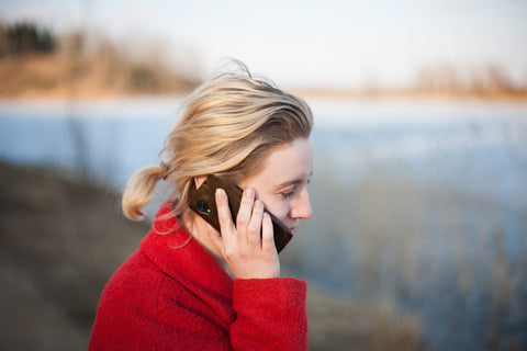 Woman using mobile phone to call
