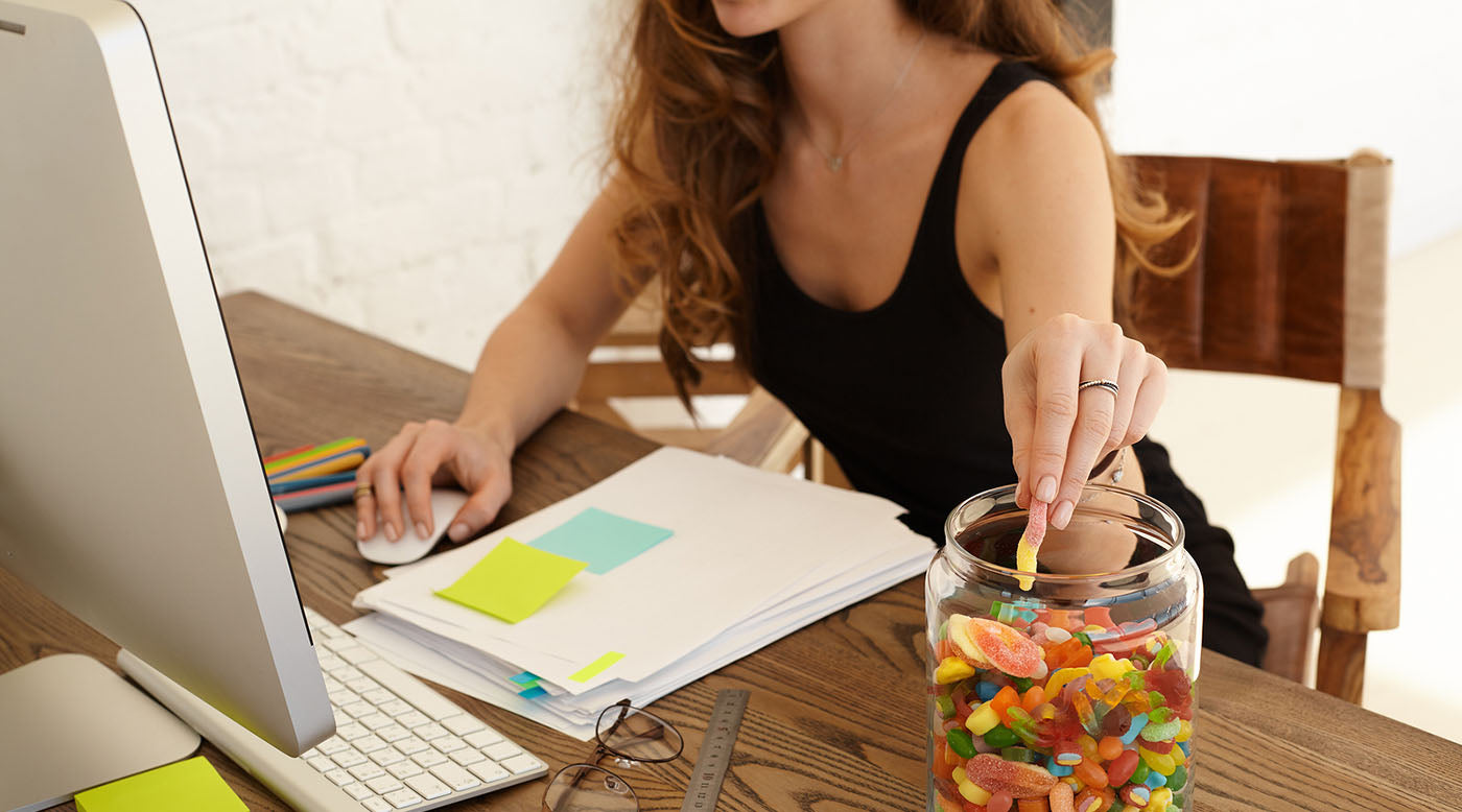 woman eating candy