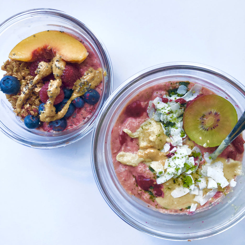 Smoothie bowls drizzled with natural peanut butter.