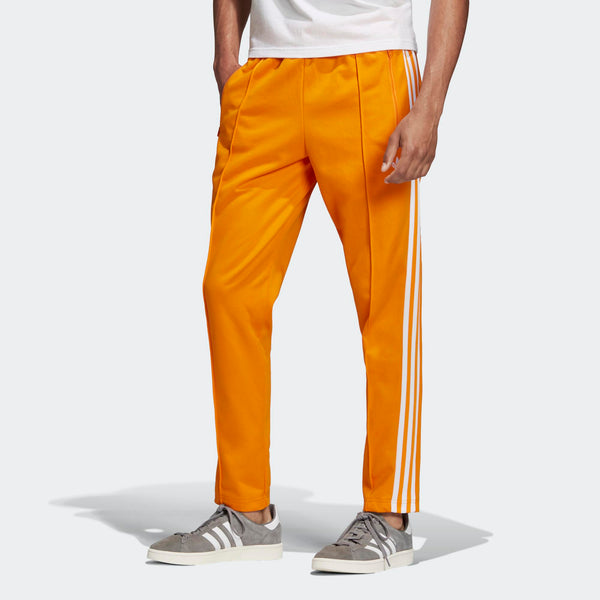 adidas beckenbauer track pants orange