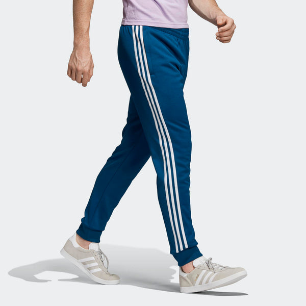 adidas sst track pants blue