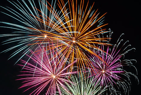A number of fireworks exploding in many different colours