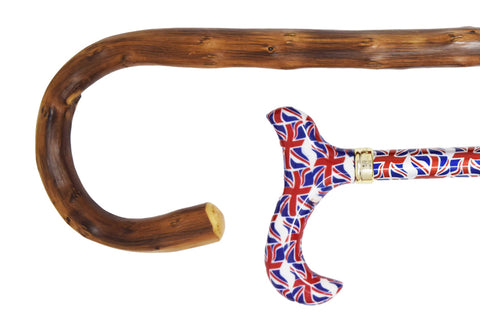 A close-up of a classic, wooden walking stick alongside a funky, modern one that is covered with Union Jacks