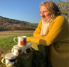 Artist Catriona Hall with Dog & Dome mugs