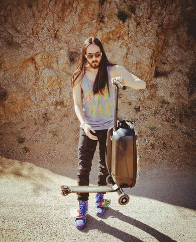 Steve Aoki With Luggage Scooter 
