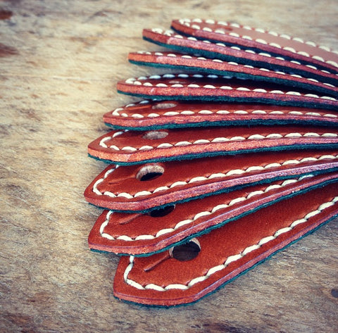 English Bridle leather tabs. Hand sewn in England 