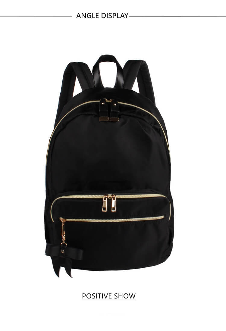 detail display of black nylon backpacks