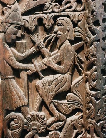 Sigurd kills Regin (12th-century carving photographed by UPenn,via Wikimedia, https://commons.wikimedia.org/wiki/File:Sigurd_Portal_(Sigurd_kills_Regin).png--Viking Dragon Blogs