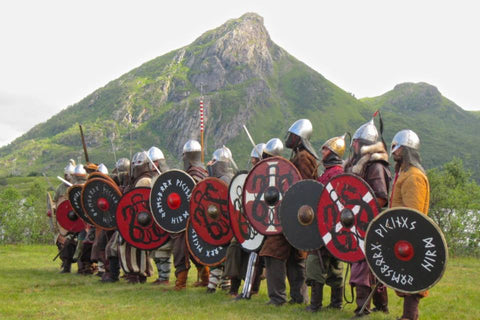 Viking warriors lining up at Lofotr Viking Festival - Viking Dragon Blogs