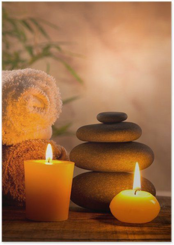 Towels, hot stones and lit candles