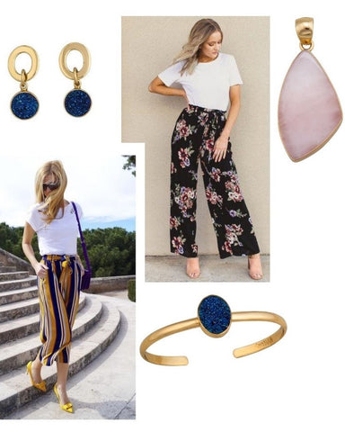 Earrings, gold cuff, and a pendant with printed pants and a white t-shirt
