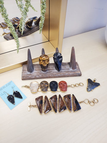 Skull ring and bracelet; shark tooth earrings and bracelet