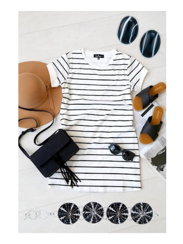 Striped dress with back bag, sunhat, sunglasses, sandals and  black earrings