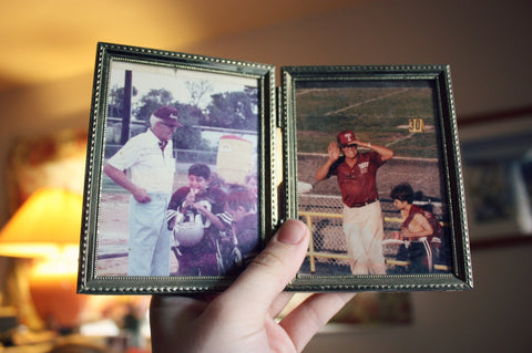 Two photos in picture frame of father and son at football field
