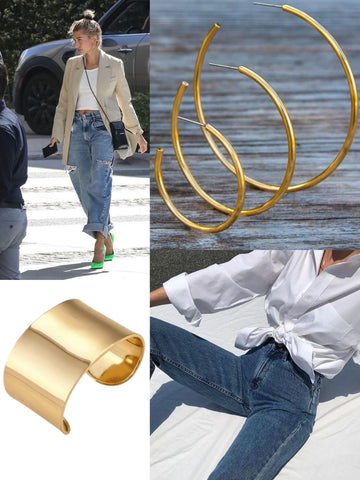 Gold jewelry accompanied with white t-shirts and blue jeans